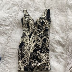 Black and gold mini dress